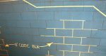 A photo of the mural of the steps inside Westby hall for the Rowan University Public Art Project.